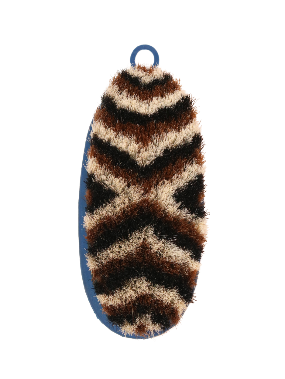 Soft brush with natural bristles. Small, non-slip surface.