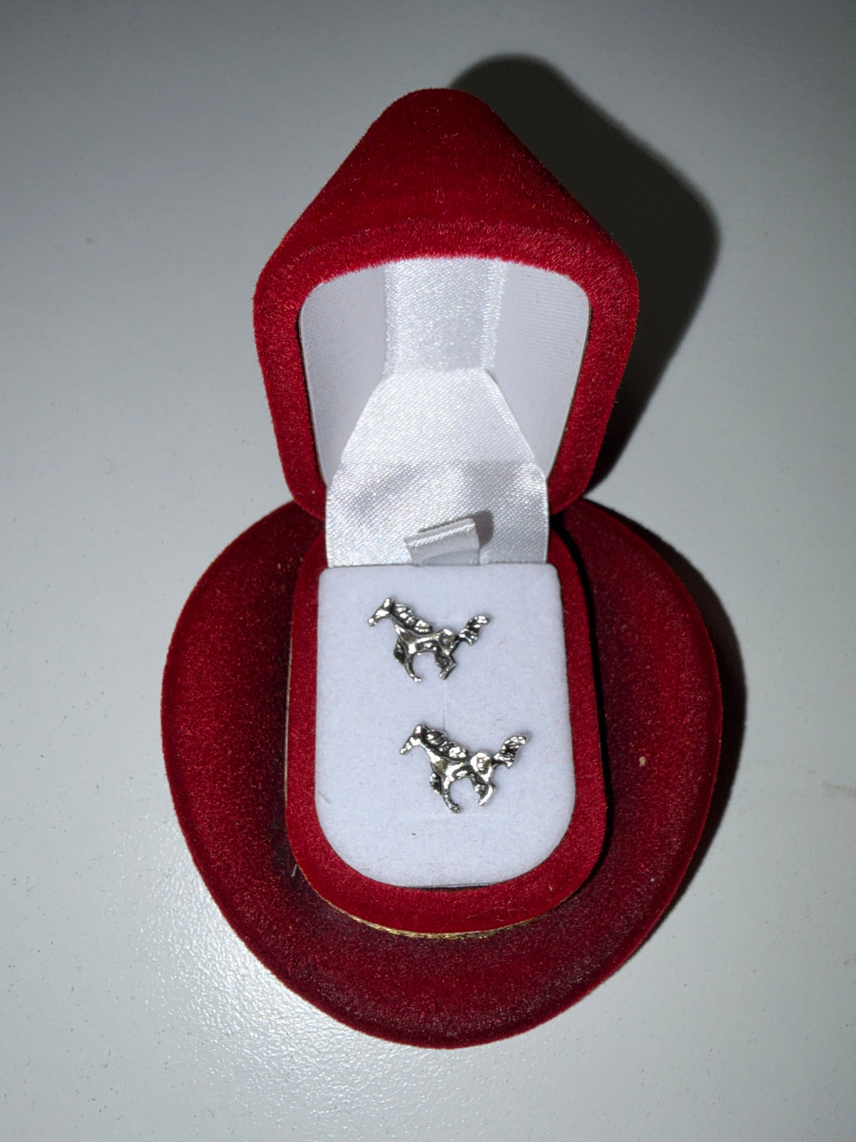 Earrings in a turquoise drop hat