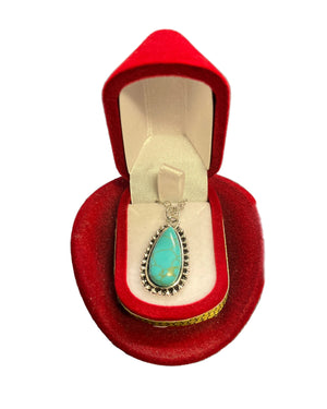 Turquoise teardrop necklace in a hat