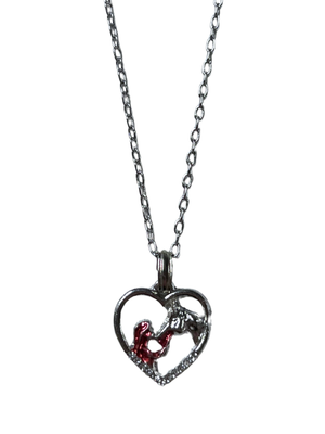 Collier avec petite breloque coeur avec fille et cheval